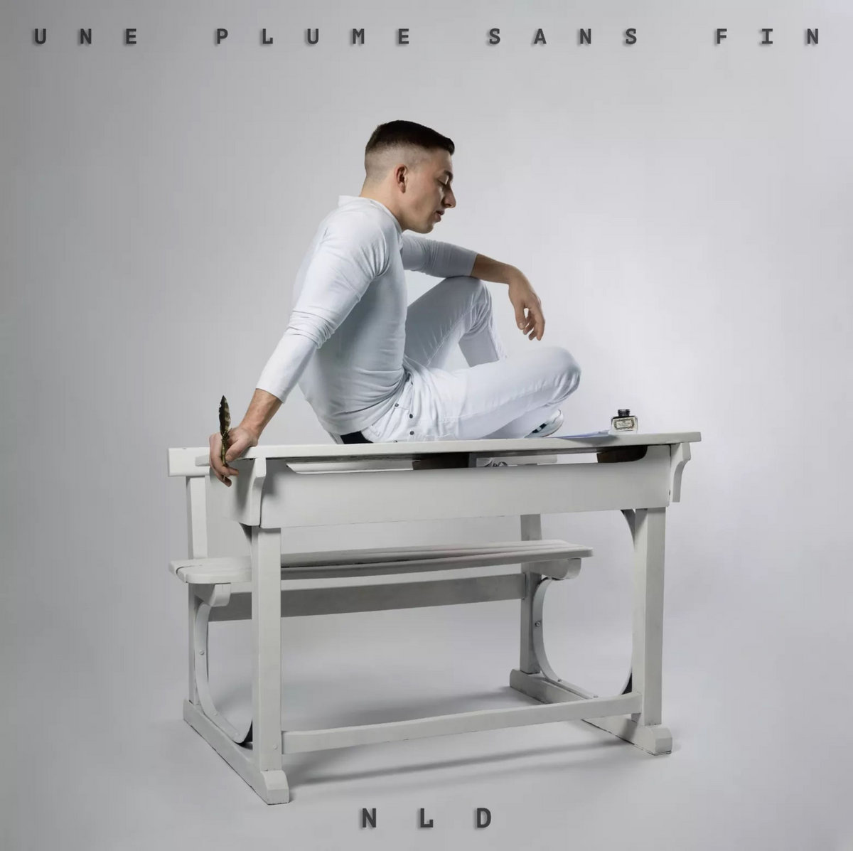 nld une plume sans fin